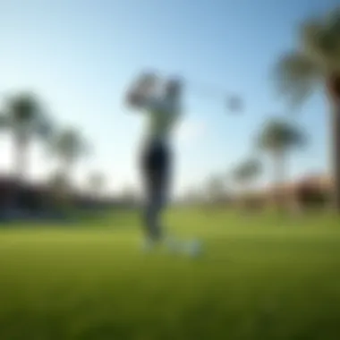 Golfer teeing off at Arabian Ranches Golf Club against a backdrop of palm trees and blue skies